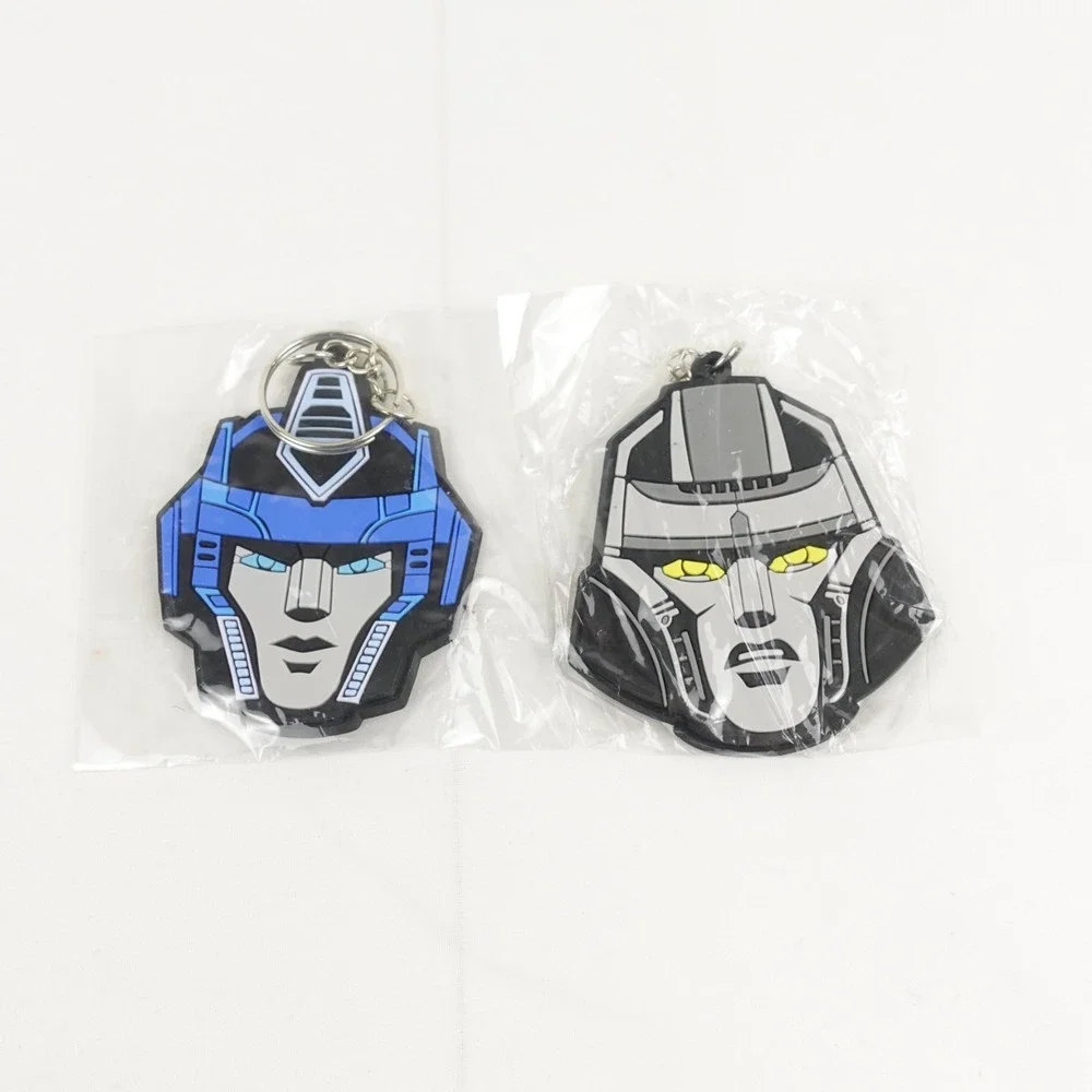 Transformers One (2024) Optimus Prime Megatron Keychain AMC Fan Event Exclusive